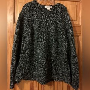 Linda Mathew’s black & grey knit sweater